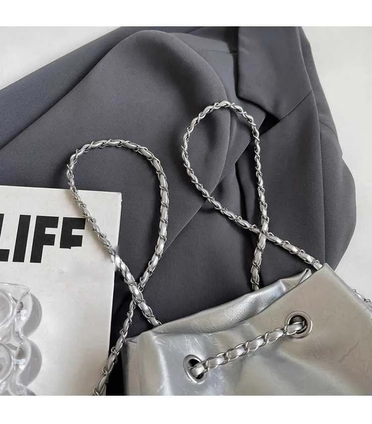 Borsa a secchiello in pelle da donna con ricamo e tracolla_voghion.com