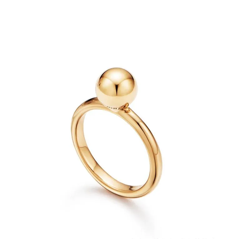 Bracciale rigido lotus elegante da donna placcato oro e argento_voghion.com