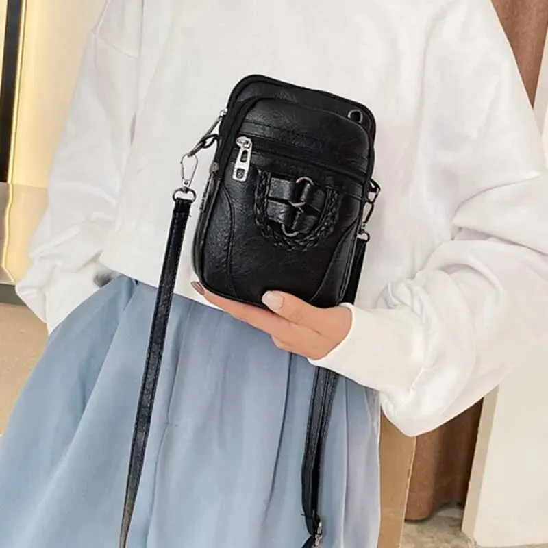 Bolsa transversal vintage de couro sintético para celular_voghion.com
