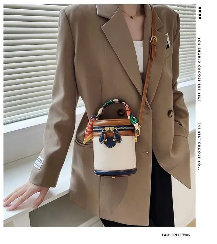 Borsa a secchiello in tela beige borsa a tracolla e a mano_voghion.com