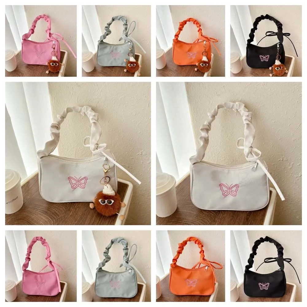 Borsa a tracolla con fiocco ricamato e farfalla Y2k Oxford in nylon con fiocco, grande capacità, stile coreano_voghion.com