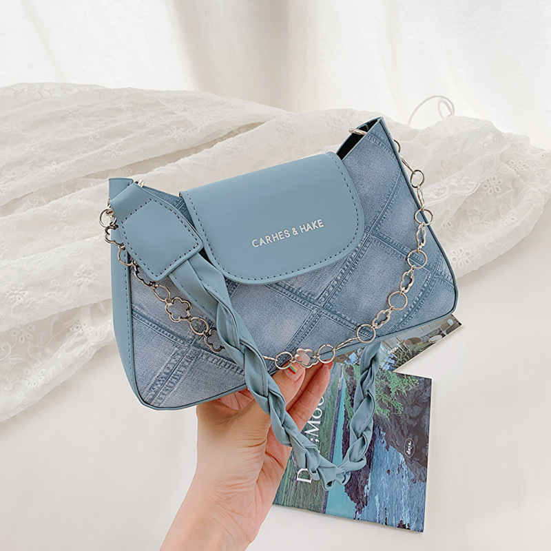 La niche populaire de cette année pour les femmes de l'été 2024, nouveau sac à bandoulière texturé haut de gamme, sac à bandoulière simple sous le bras