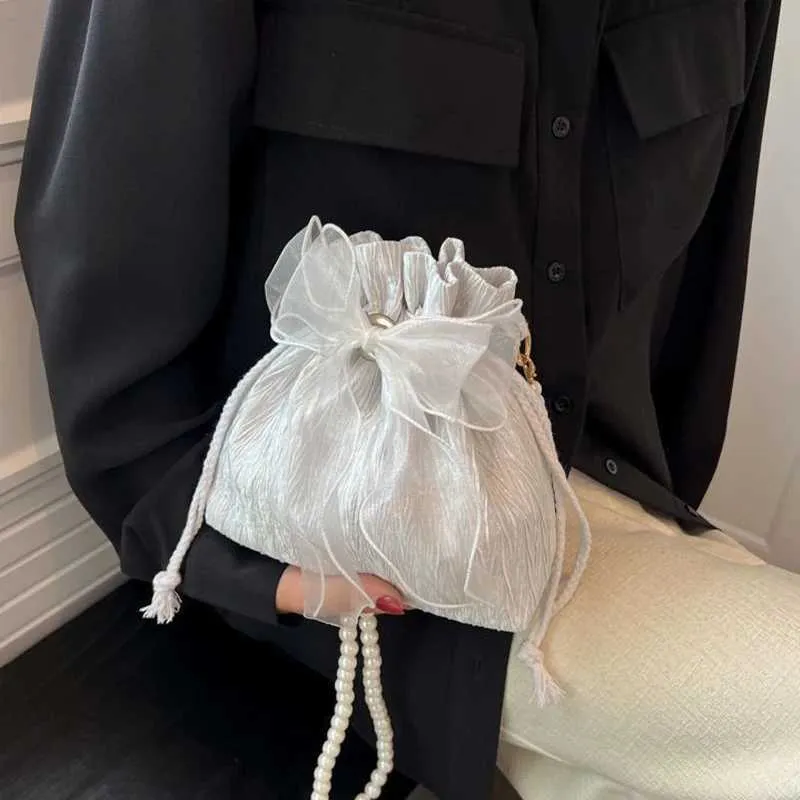 Spitze Schleife Satin Eimer Frauen Mode süße Perle Kette Schulter Umhängetasche Kordelzug Handtasche Party Kupplung_voghion.com