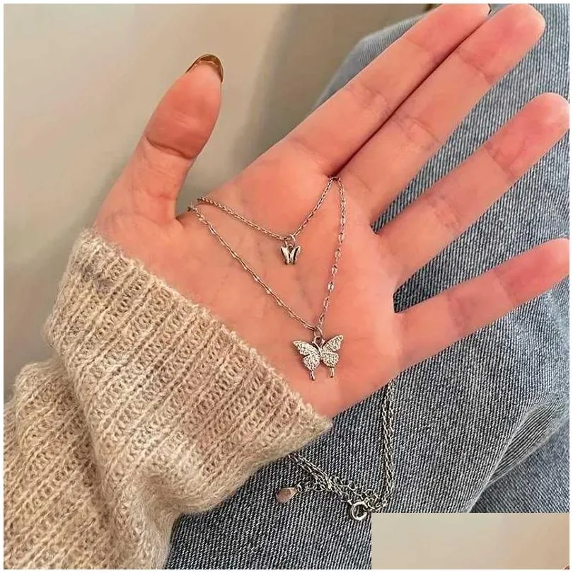 Collane con ciondolo Collana a doppio strato con farfalla e set di gioielli per feste con dichiarazione in zircone brillante Regaliq Drop_voghion.com