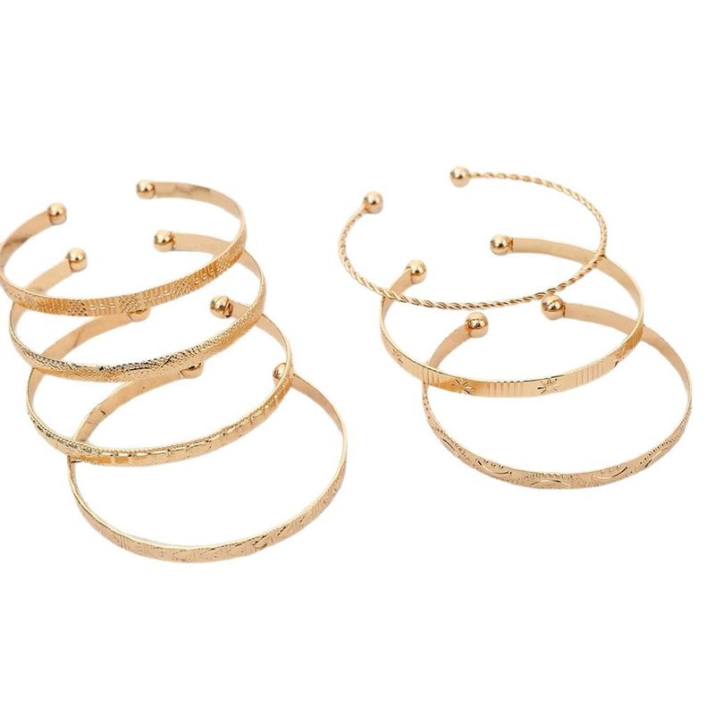 Retro Personality Exaggerated Wide Gold Glossy Multi Element Set Bracelet_voghion.com