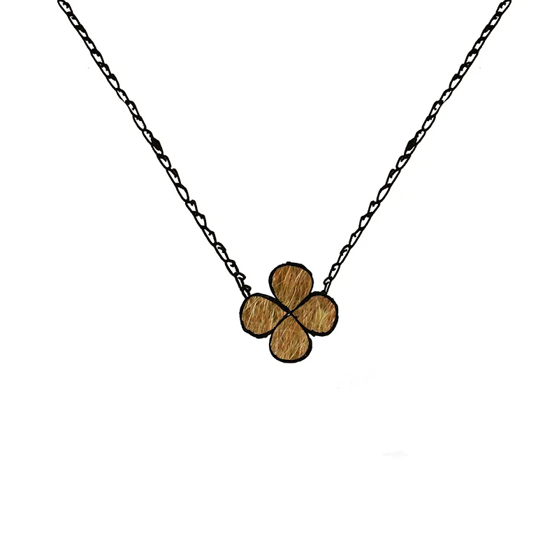 Klöverhalsband med hängsmycke och pärlemorblomma_voghion.com