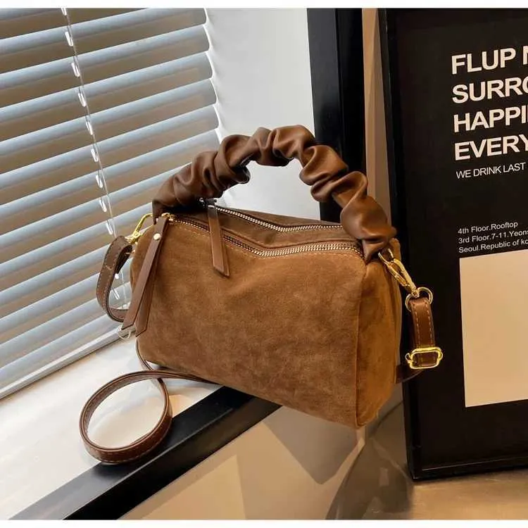 Modieuze schoudertas en crossbody tas met plooi voor dames_voghion.com