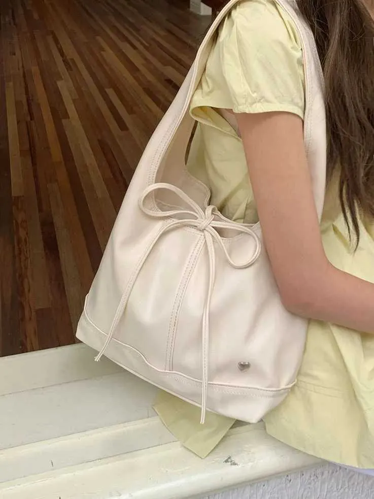 Elegante dames schoudertas en handtas met strik design_voghion.com