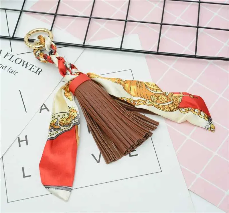 Pingente de lenço com borla de couro macio e fofo, acessório para bolsa, novo chaveiro, porta-chaves de carro da moda K1690 Y241121_voghion.com