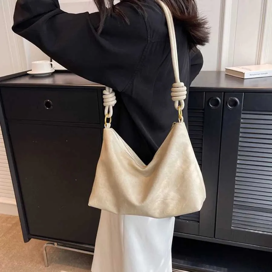Borsa a tracolla da donna con texture in pelle morbida geometrica_voghion.com