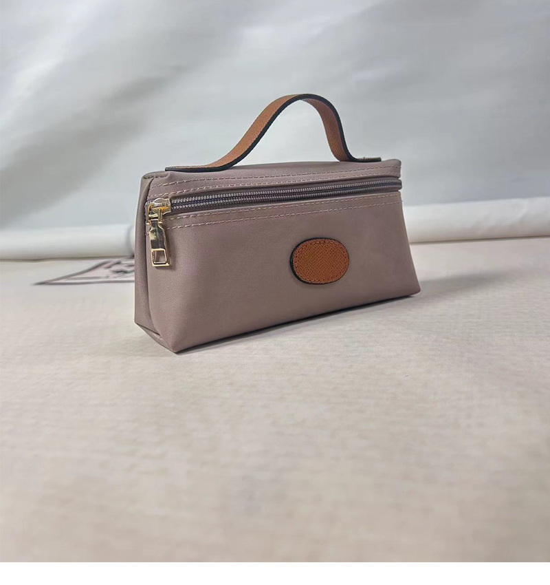 2024 nuova mini borsa per cosmetici portatile alla moda, portamonete per gnocchi alla moda, in nylon femminile, impermeabile e leggero_voghion.com