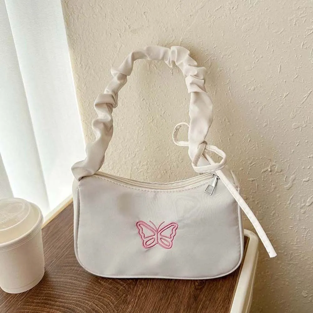 Borsa a tracolla con fiocco ricamato e farfalla Y2k Oxford in nylon con fiocco, grande capacità, stile coreano_voghion.com