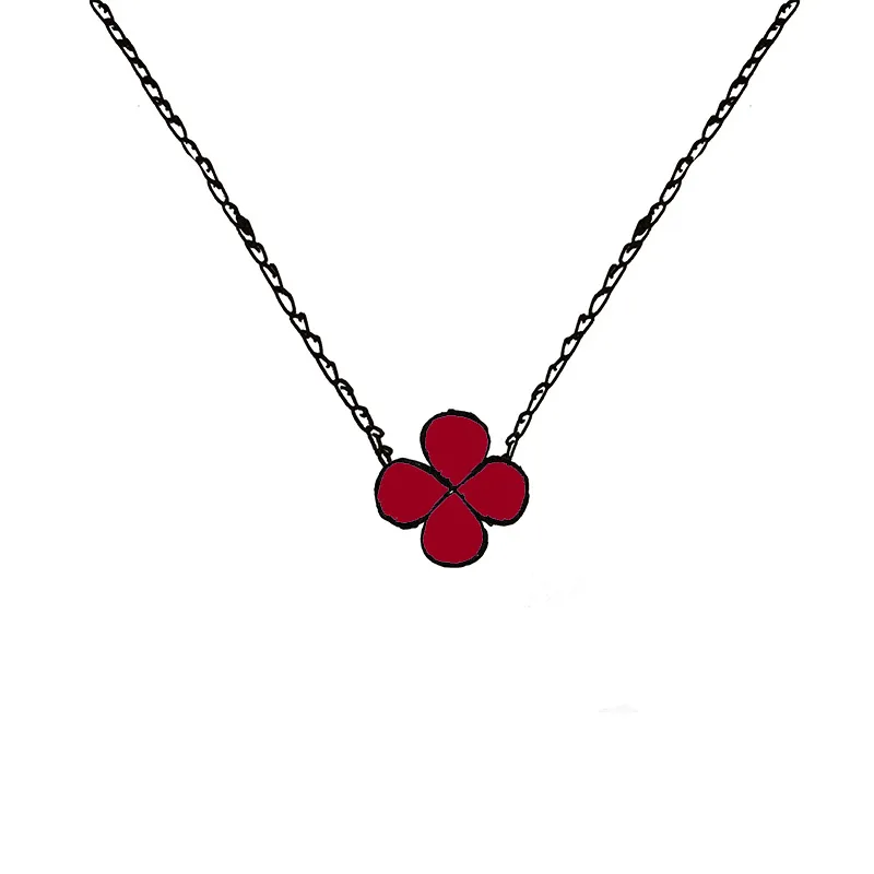 Klöverhalsband med hängsmycke och pärlemorblomma_voghion.com