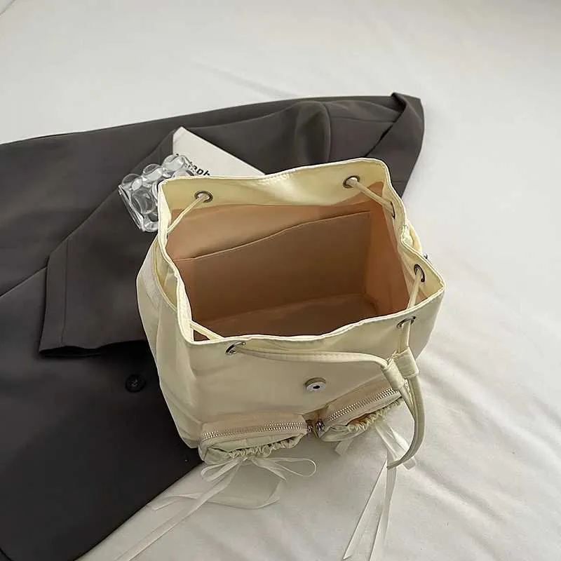 Bogen Design Frauen Kleine Nylon Rucksäcke 2024 Frühling Y2K Koreanische Mode Einfarbig Rucksack Dame Reise_voghion.com