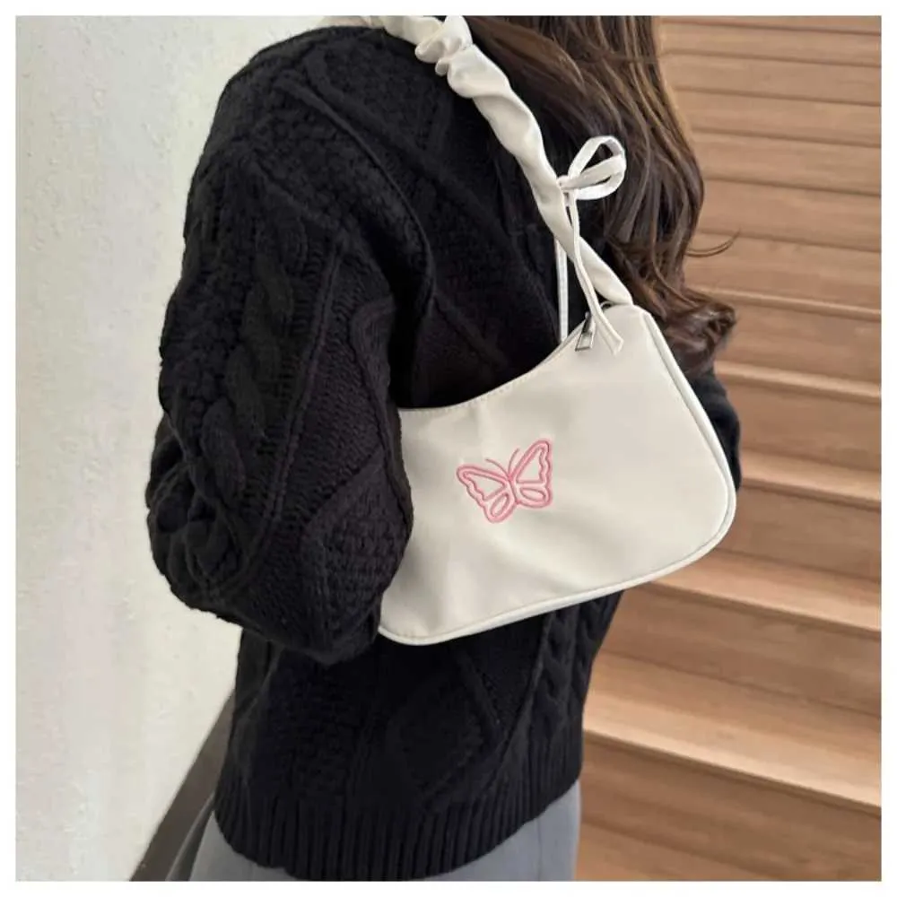 Tikand Bowknot Shoder Bag Y2k stiilis volangidega käepide Nyl Bow meigipulga kott käekott Y241026_voghion.com