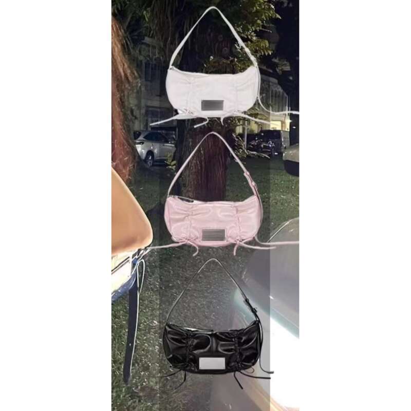 Borsa a tracolla con coulisse e fiocco in metallo di nicchia coreana_voghion.com