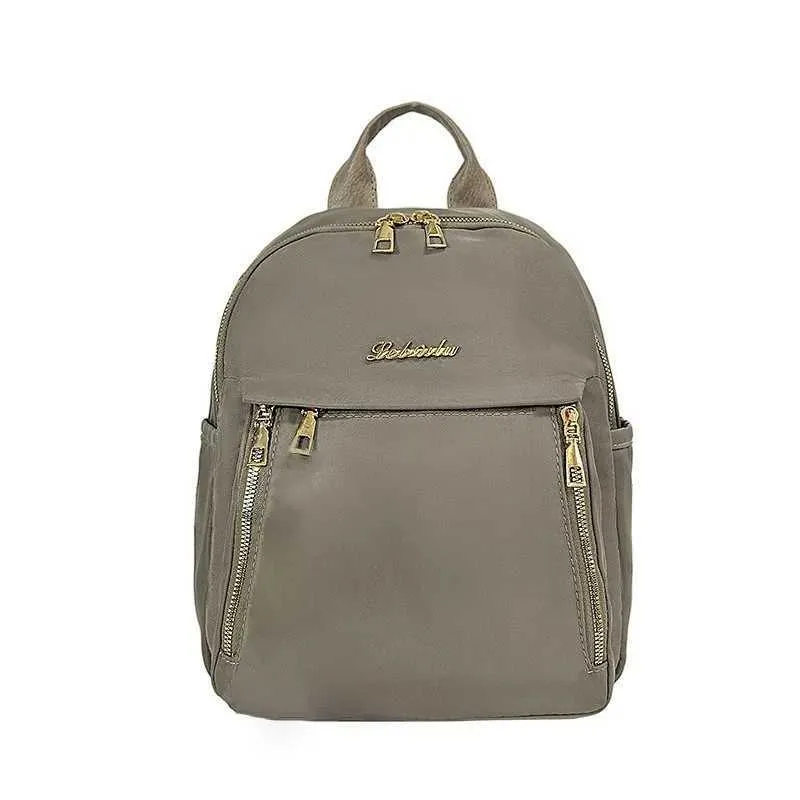 Sac à dos tendance en nylon imperméable à fermeture éclair de grande capacité avec filetage 2024 Hot Selg Sac polyvalent pour femme Mochila Mujer Y241116_voghion.com