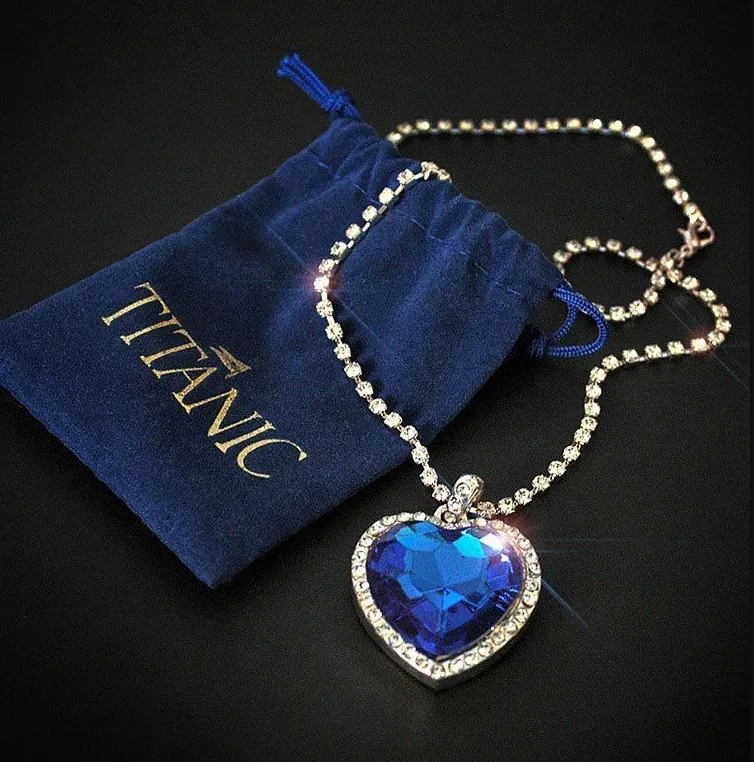 Set di gioielli da sposa con ciondolo a forma di cuore blu oceano Love Forever e orecchini Titanic Veet Bag 230907_voghion.com
