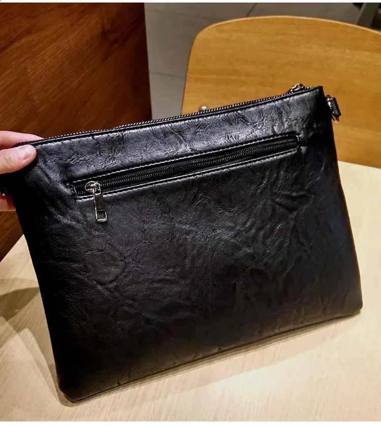 Pochette envelope con borchie borsa a tracolla borsa a spalla_voghion.com