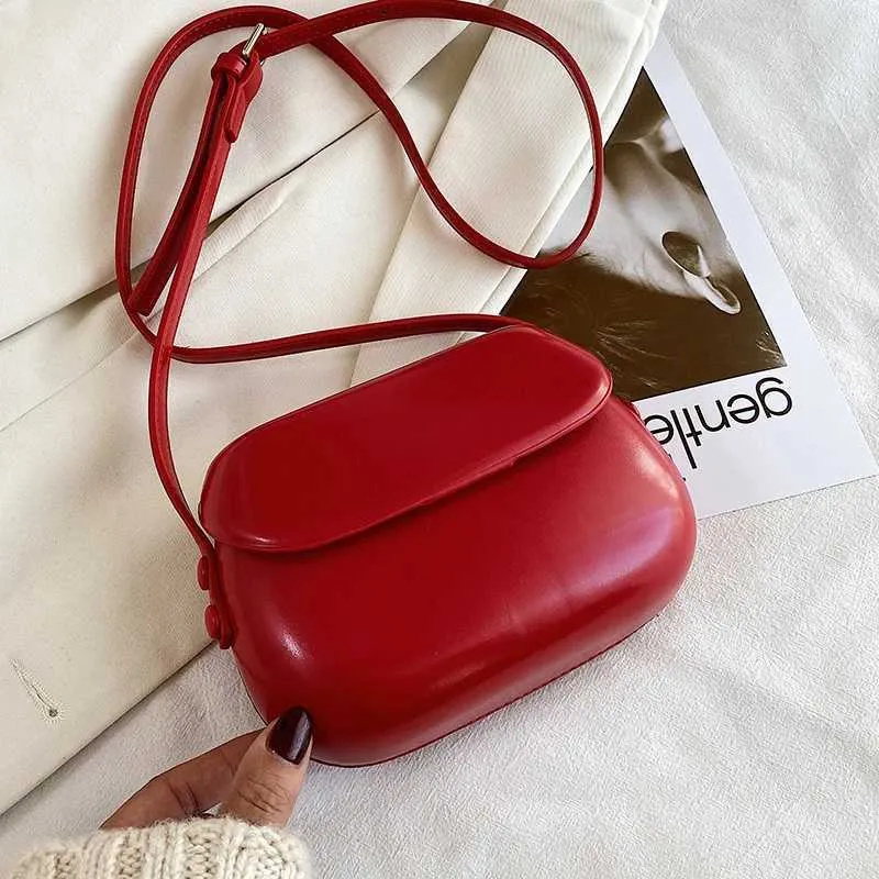 Dames schoudertas messenger bag van glanzend kunstleer_voghion.com