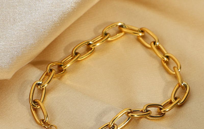 Bracciale da donna ovale in acciaio inossidabile placcato oro con graffetta classica alla moda e ghiera OT_voghion.com