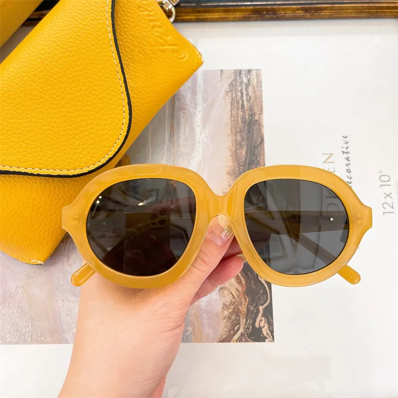 designer of Women and eyewear Summer Outdoor Fashion Style Beach Glasses Sports Flying men Sunglasses LW 40105F_voghion.com