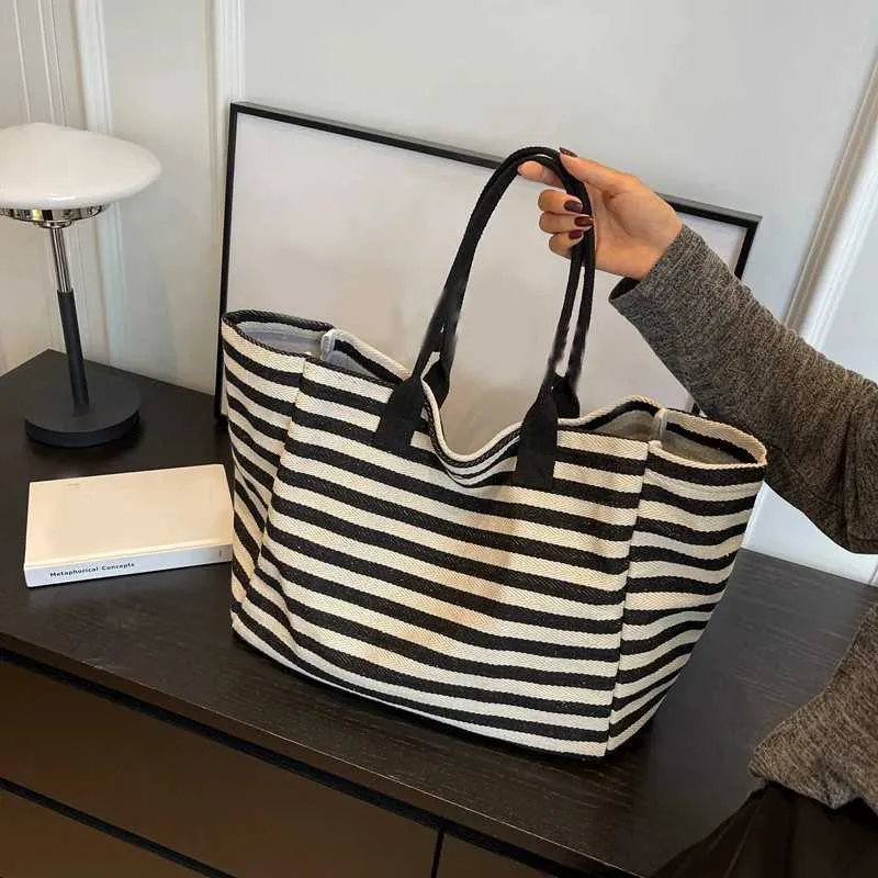 Borse da shopping in tela da donna, design a strisce alla moda e semplice per ragazze, borse di alta qualità Y241109_voghion.com