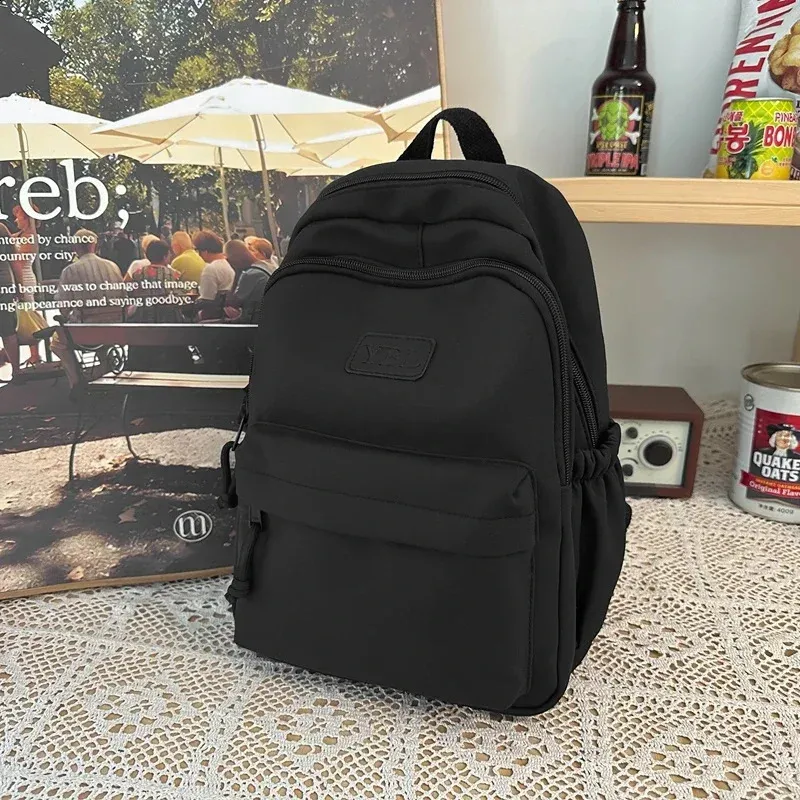 Large capacity casual waterproof nylon backpack fashionable elementary and middle school student bag 240820_voghion.com