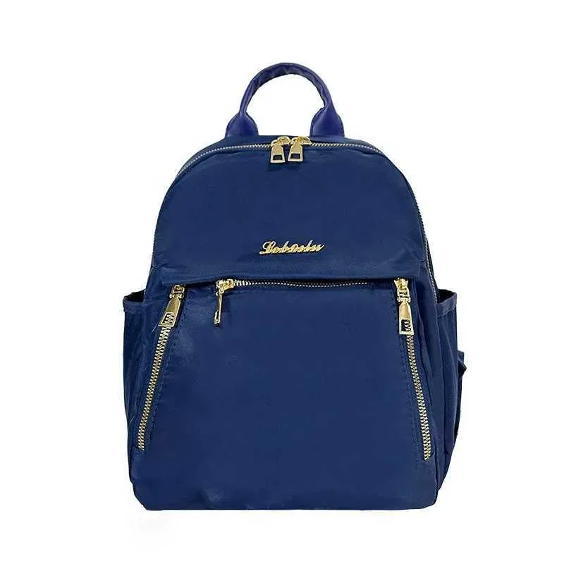 Sac à dos tendance en nylon imperméable à fermeture éclair de grande capacité avec filetage 2024 Hot Selg Sac polyvalent pour femme Mochila Mujer Y241116_voghion.com