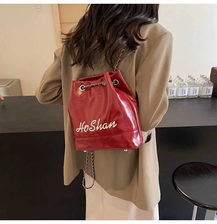 Borsa a secchiello in pelle da donna con ricamo e tracolla_voghion.com