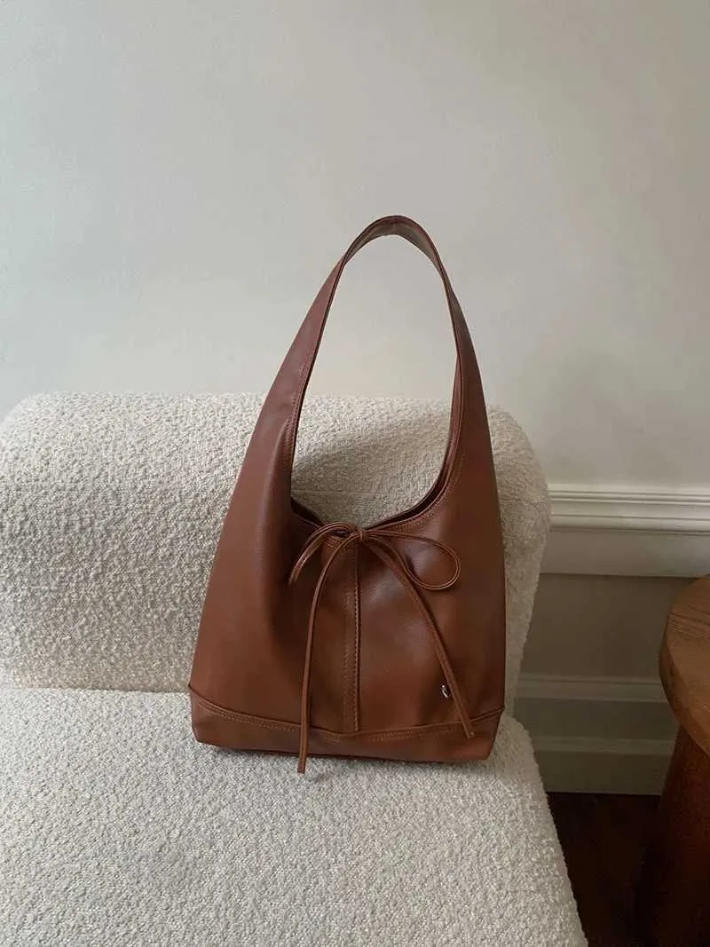 Elegante dames schoudertas en handtas met strik design_voghion.com