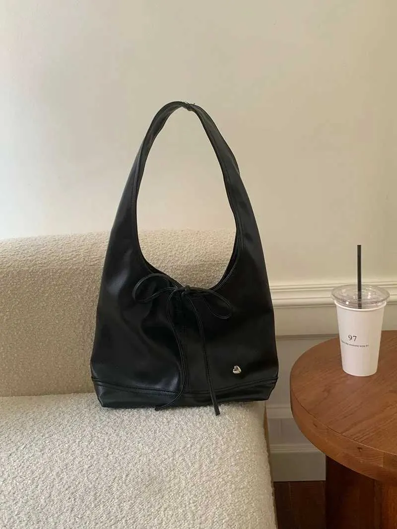 Elegante dames schoudertas en handtas met strik design_voghion.com