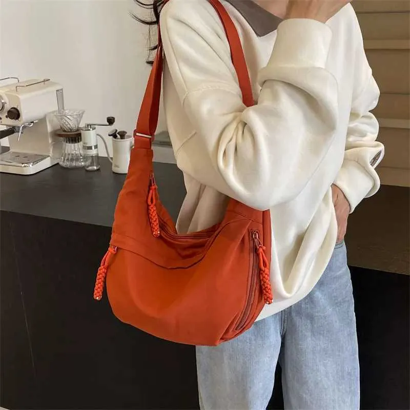 Sac à bandoulière en nylon 2024 pour femme, nouvelle collection été, grande capacité, design polyvalent et de niche, messager Ba241103_voghion.com