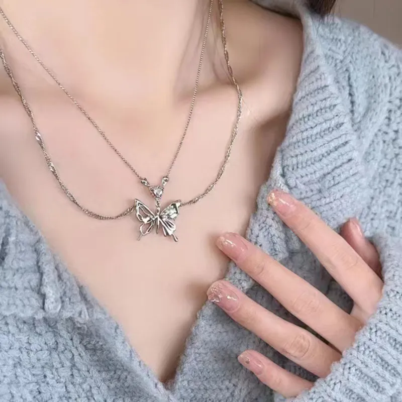 Collier avec pendentif en forme de cœur et de papillon en cristal de couleur argent pour femme, chaîne de clavicule à double couche, tendance et tendance_voghion.com