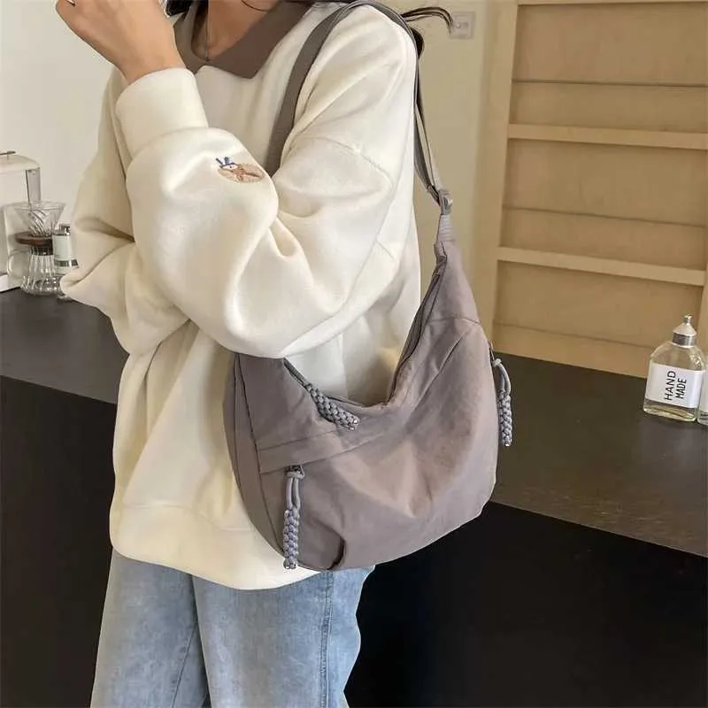 Sac à bandoulière en nylon 2024 pour femme, nouvelle collection été, grande capacité, design polyvalent et de niche, messager Ba241103_voghion.com