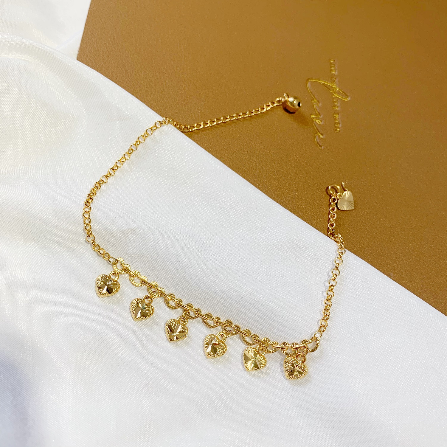 Bracelet de cheville vietnamien en plaqué or avec cœur creux, couleur longue durée, pompon en cuivre plaqué pour femme, été_voghion.com