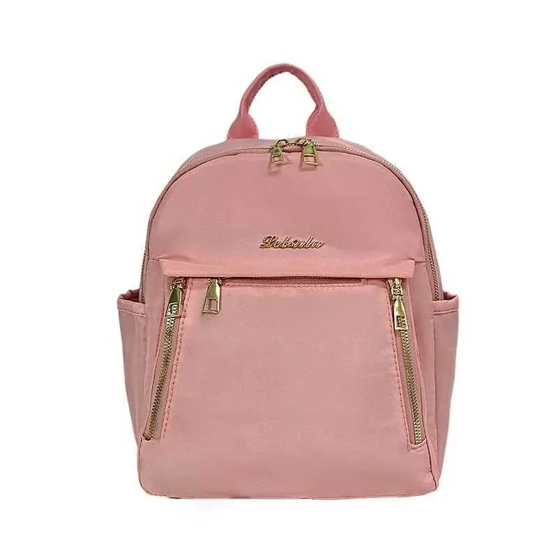 Sac à dos tendance en nylon imperméable à fermeture éclair de grande capacité avec filetage 2024 Hot Selg Sac polyvalent pour femme Mochila Mujer Y241116_voghion.com