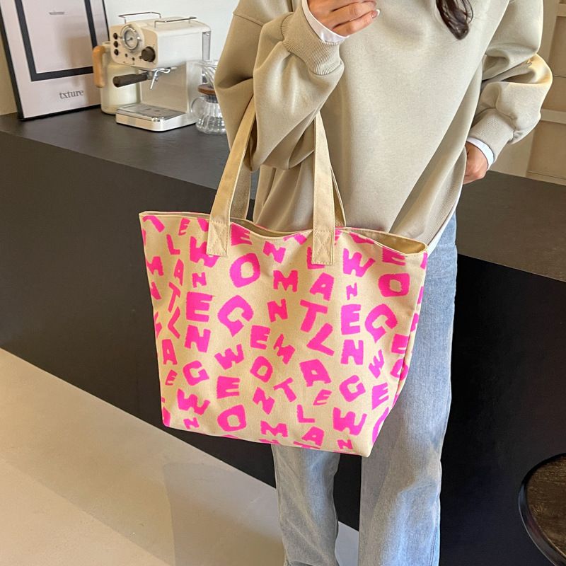 Persönlichkeit bedruckter Buchstabe Mommy Bag 2024 neue Textur Farbkontrast Freizeit Canvas große Kapazität Tote_voghion.com