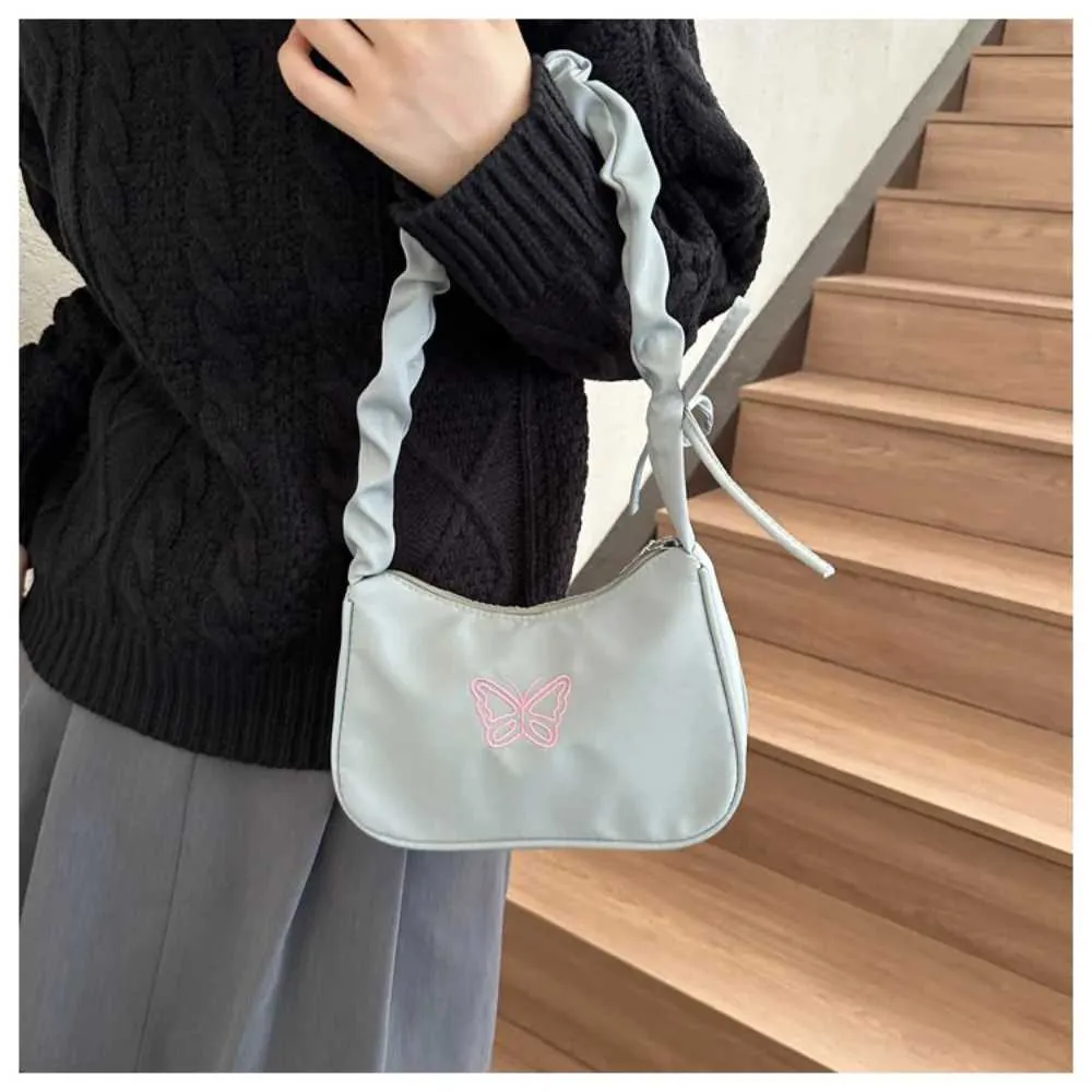 Tikand Bowknot Shoder Bag Y2k stiilis volangidega käepide Nyl Bow meigipulga kott käekott Y241026_voghion.com