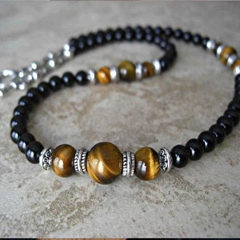 Collana con pendente a punta di freccia in pietre dure uomo_voghion.com