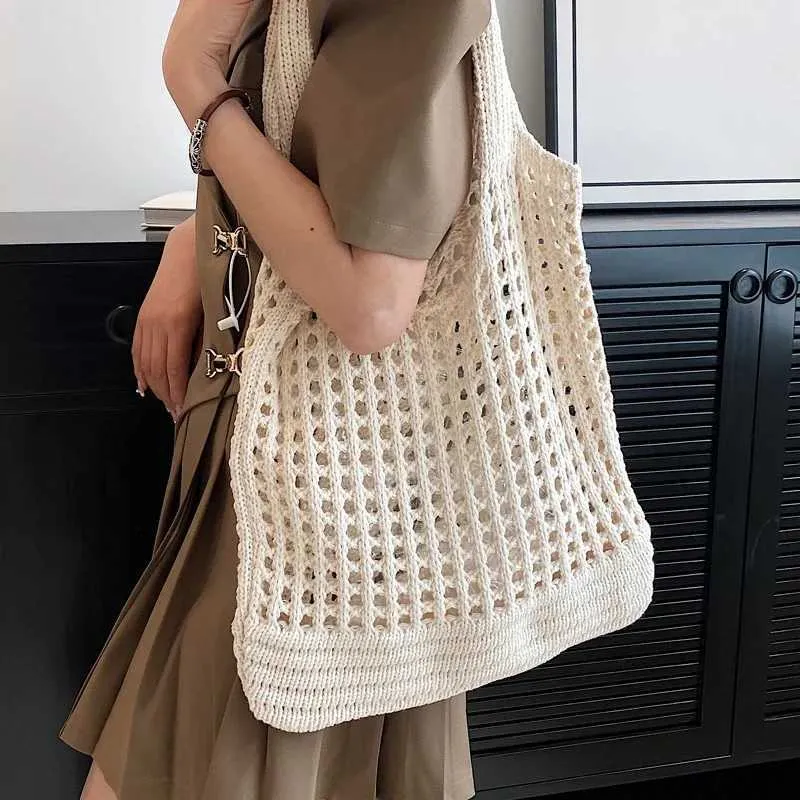 Knitted hollow shoulder lower arm bag large capacity crochet hook womens shopping casual beach handbag Y241011_voghion.com