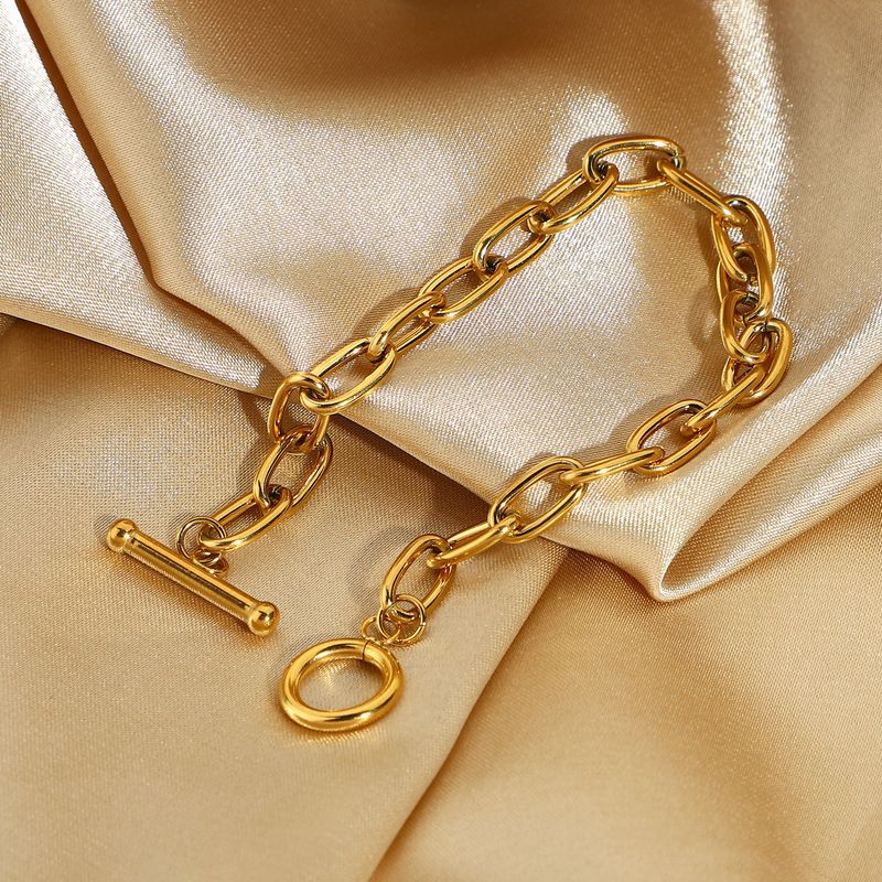 Bracciale da donna ovale in acciaio inossidabile placcato oro con graffetta classica alla moda e ghiera OT_voghion.com