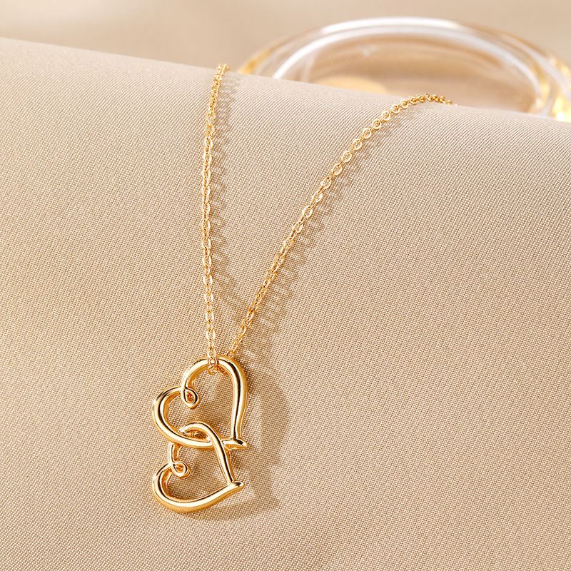 Liebesanhänger Halskette für Frauen hohler Stil hochwertiger Sinn für alle Spielpullover Schlüsselbeinkette Schmuck_voghion.com