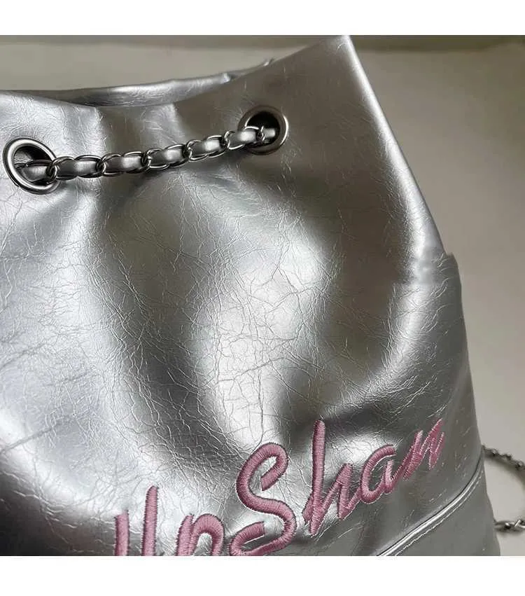 Borsa a secchiello in pelle da donna con ricamo e tracolla_voghion.com