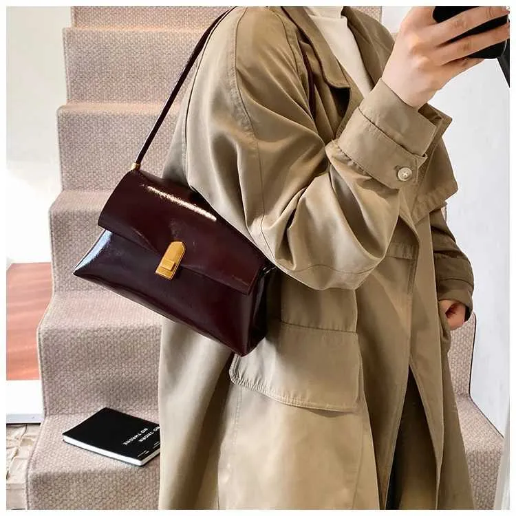 Strukturerad axelremsväska och crossbody väska för damer_voghion.com