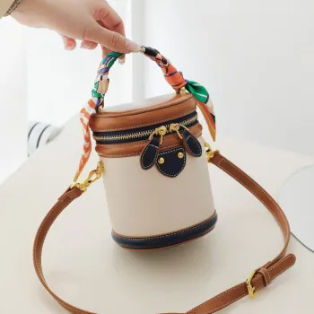Neue, von einem Nischendesigner entworfene zylindrische Tasche, eine Retro- und modische Umhängetasche für Damen_voghion.com