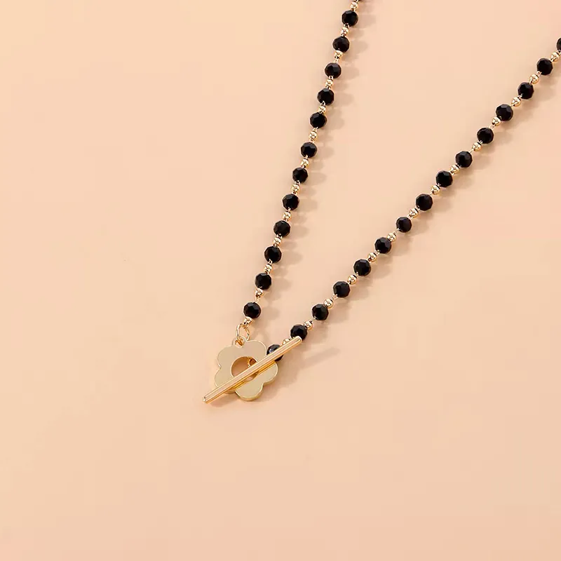 Collana con perline e chiusura toggle stile vintage donna_voghion.com