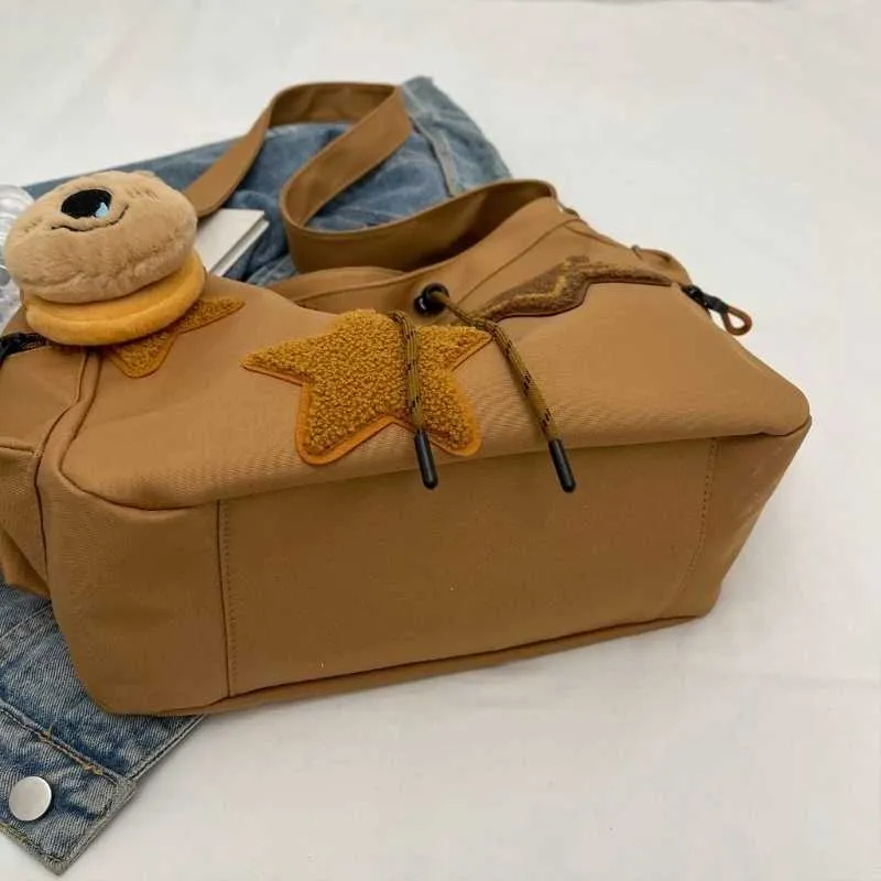 Borsa a tracolla a forma di stella in tela da donna, zaino per studenti Y241116_voghion.com