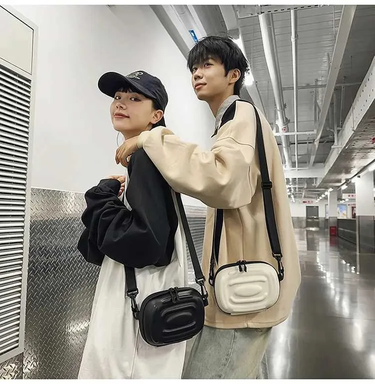 Sac à bandoulière simple polyvalent pour hommes et femmes, nouvelle marque tendance de niche, sac à bandoulière à coque rigide à la mode, petit carré_voghion.com