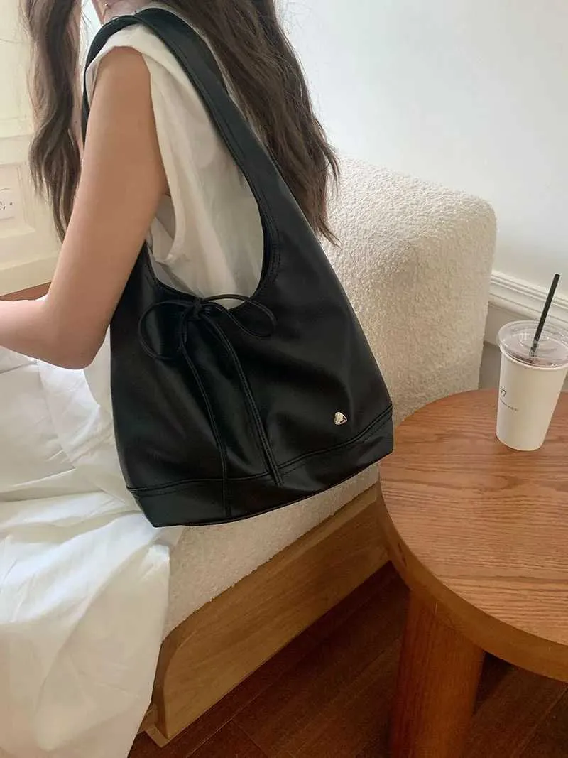 Elegante dames schoudertas en handtas met strik design_voghion.com